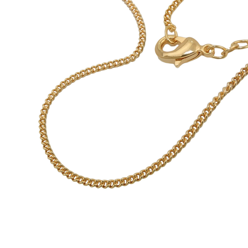 Collier plaqué or chaîne gourmette 1,6mm sur fond blanc