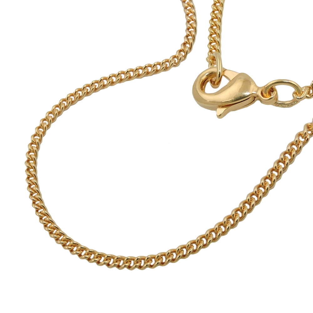 Collier plaqué or chaîne gourmette fine sur fond blanc