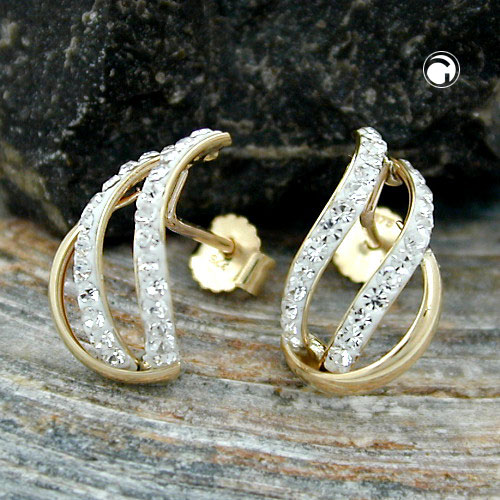 Paire de studs or 375/000 zirconias sur fond blanc