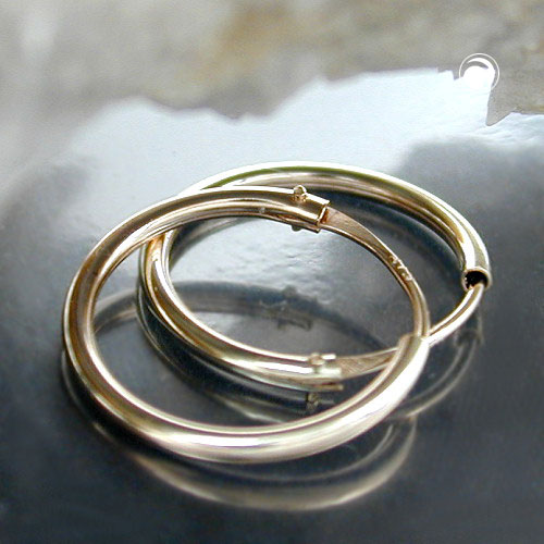Paire de boucles d'oreilles or jaune 375/000 style pucier