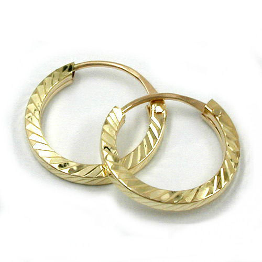 Boucles d'oreilles créoles or 9 carats facettées diamant