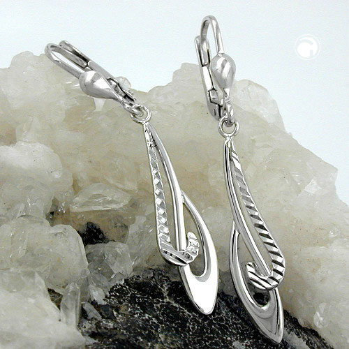 Paire de boucles d'oreilles argent sterling, vue de profil, style élégant