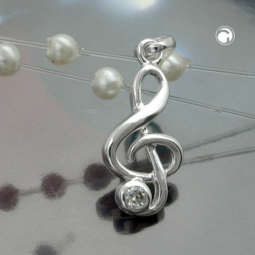 Pendentif argent clé de sol porté par un musicien, vue rapprochée du zircon