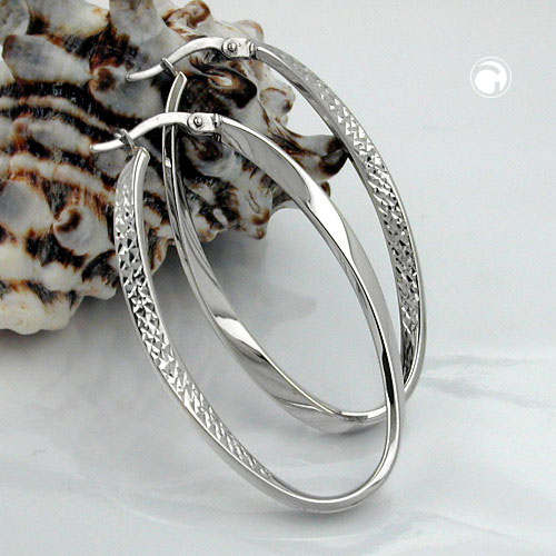 Créoles ovales argent sterling, portées sur oreille
