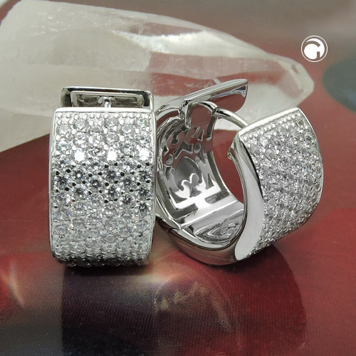 Paire de boucles d'oreilles argent sterling zirconium blanc sur fond neutre