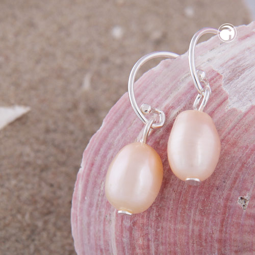 Paire de boucles d'oreilles en argent sterling et perle, vue de profil